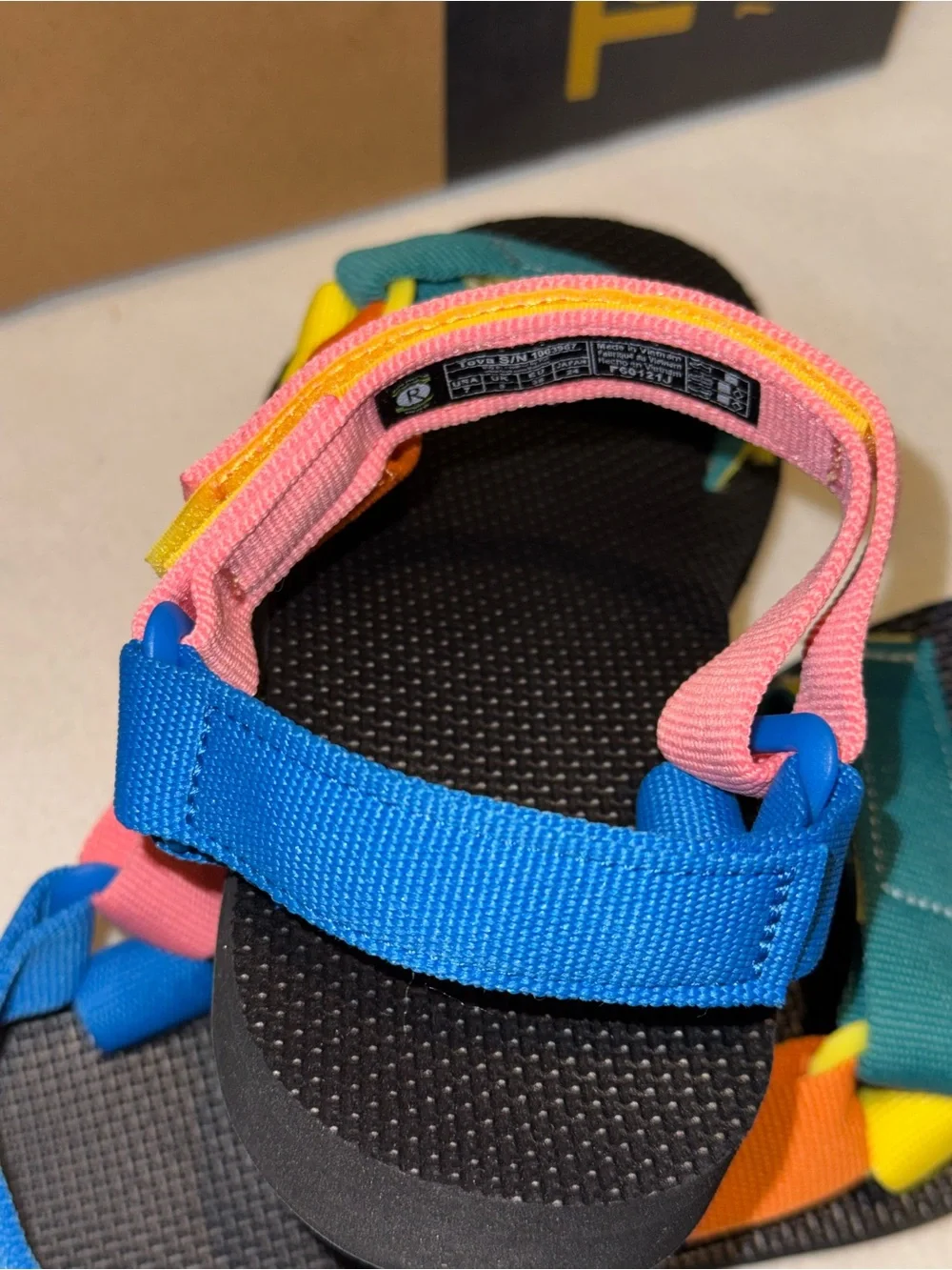 Teva Original Universal sandals in a 90s multi-color pattern